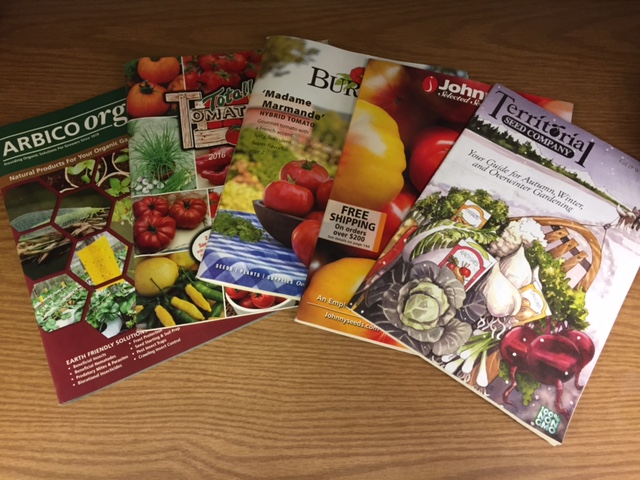Seed catalogues displayed for selecting 2017's seeds for the garden.